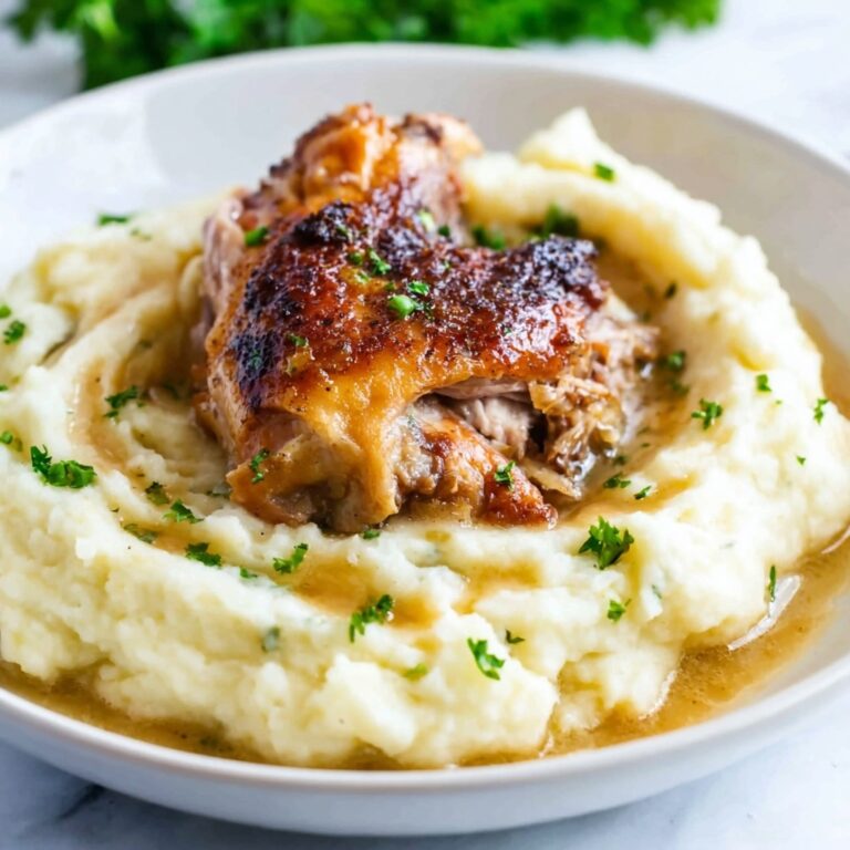 Smothered Chicken with Creamy Gravy and Aromatic Spices Recipe